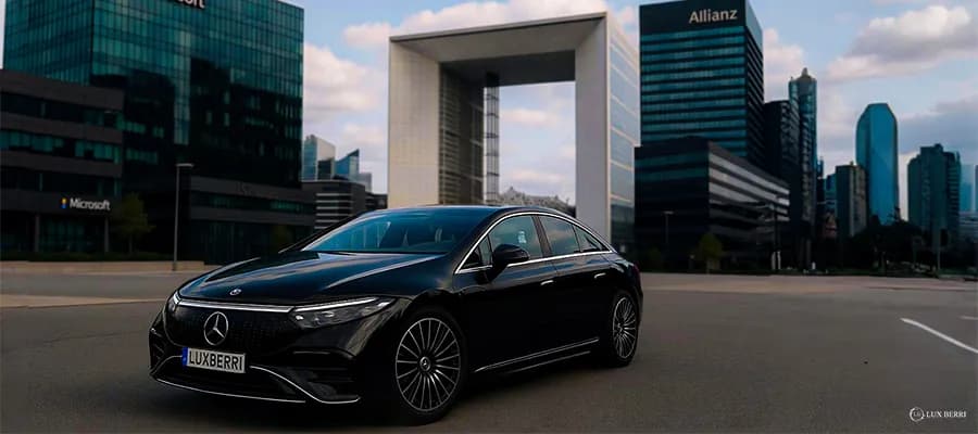 Business traveller stepping into an executive chauffeur car in Paris